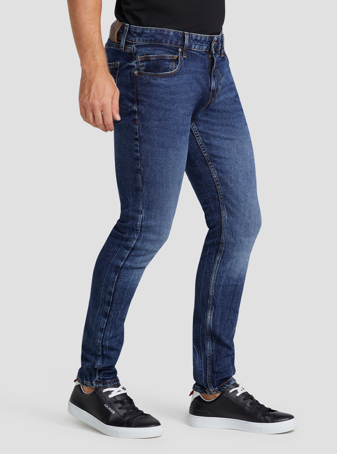 GUESS Men's Eco Low Rise Slim Tapered Denim Jeans In Kent Wash M3RAS2D4TB3 Side View