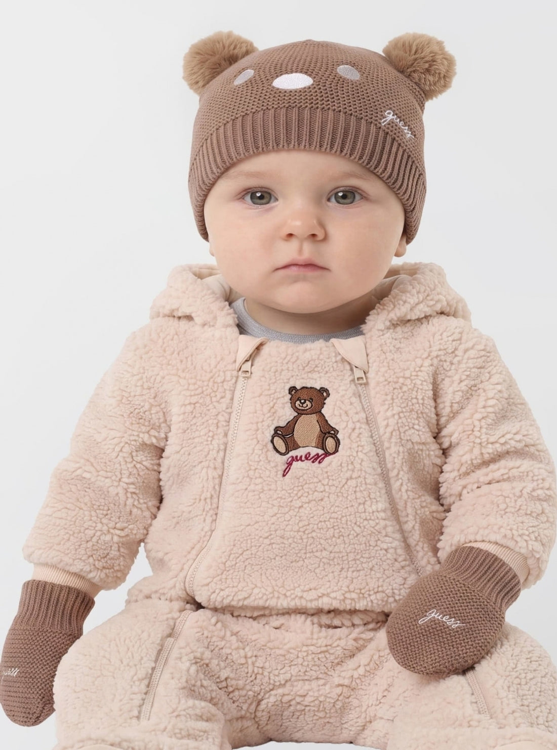 GUESS Kids Beige Bear Pom Pom Hat and Mittens Set H6BZ08Z1552 Model View