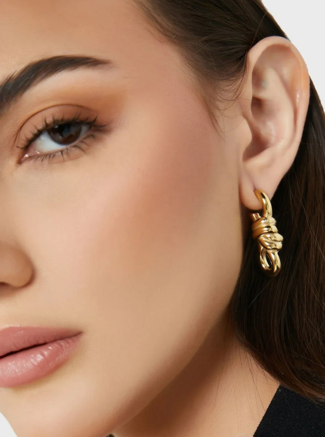 GUESS Accessories Gold Modern Love Knot Drop Earrings JUBE04002JWYGT Model View