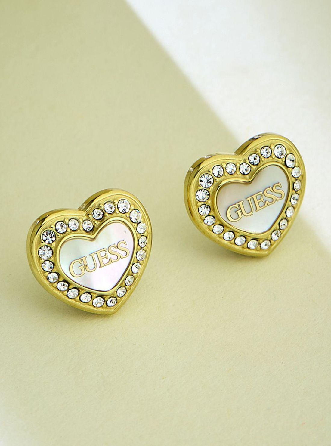 GUESS Accessories Gold Amami MOP Heart Stud Earrings JUBE04028JWYG Front View`