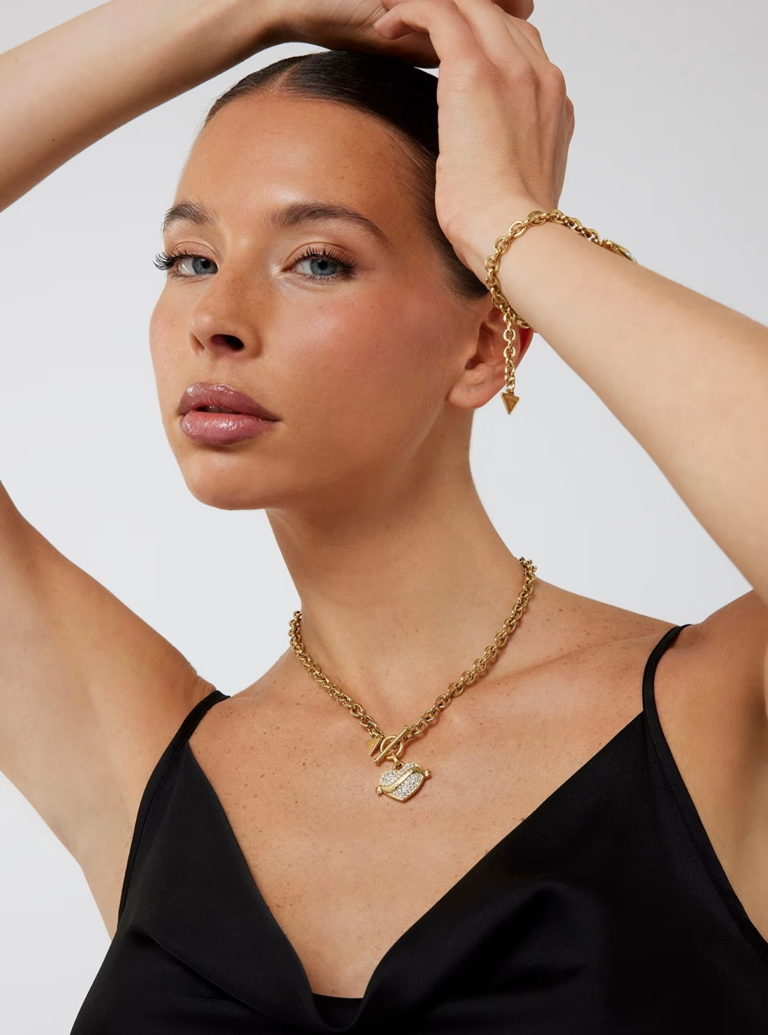 GUESS Accessories Gold Crystal Heart T-Bar Necklace JUBE05477JW Model View