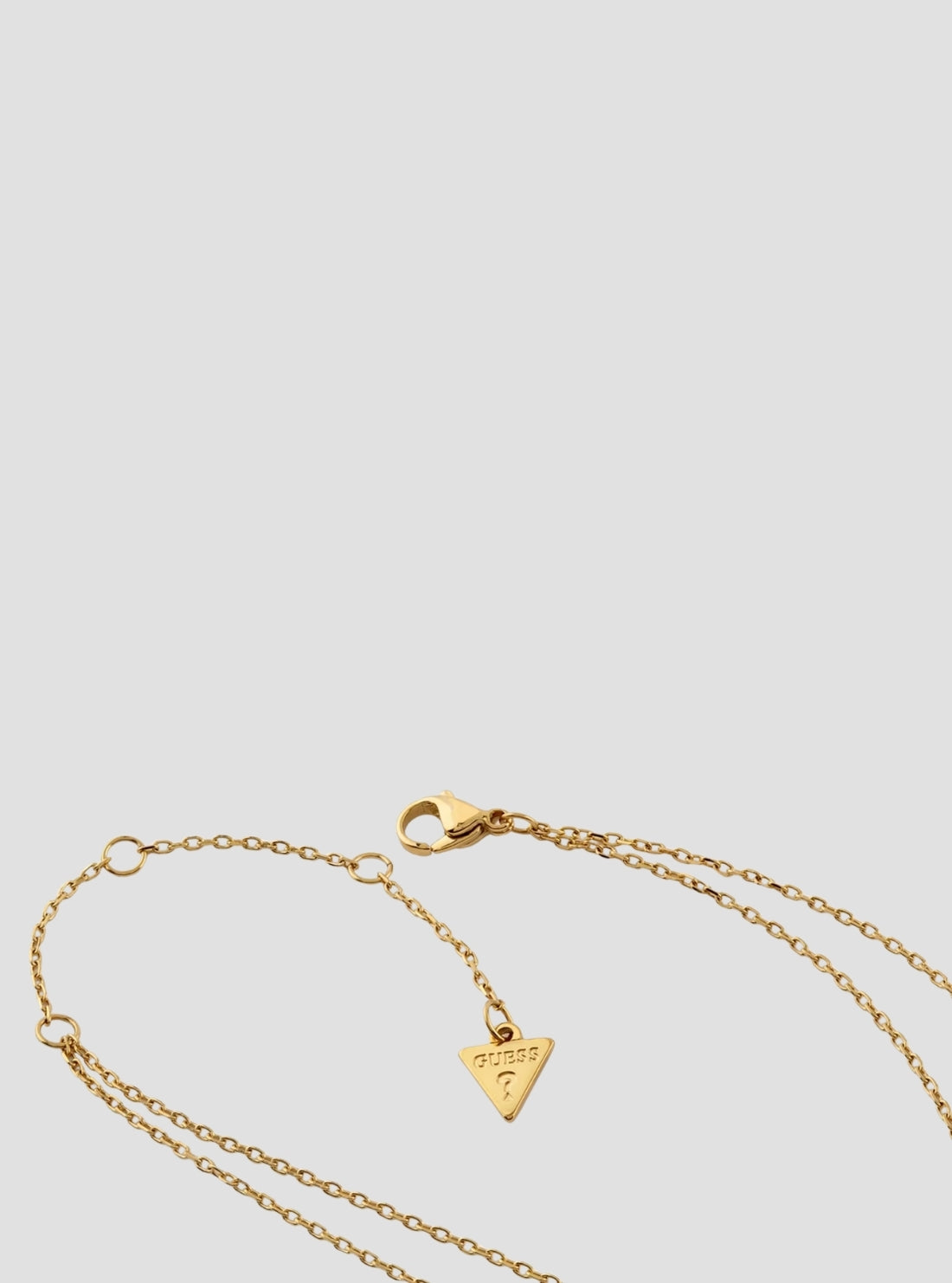 GUESS Accessories Gold Heart Charm Necklace JUBN05056JWYGT Detail View