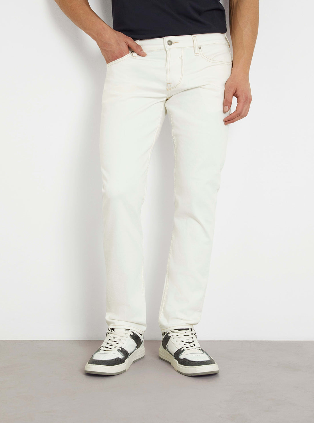 White Low-Rise Slim Tapered Jeans in White Wash