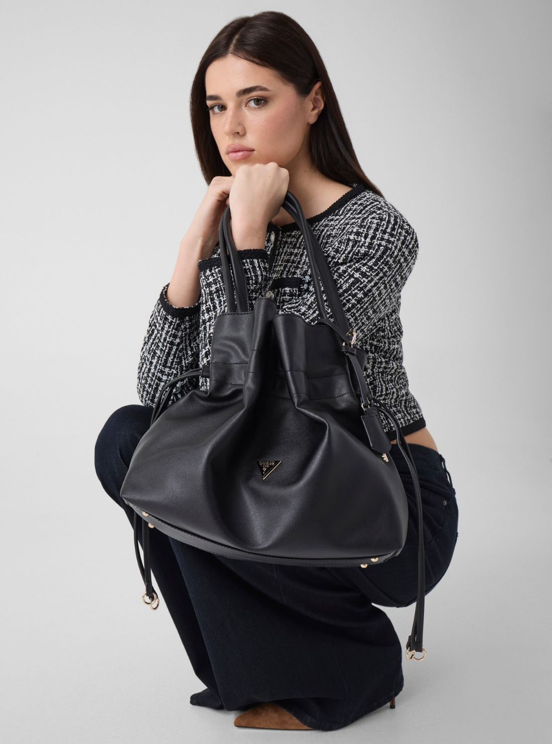 GUESS Womens Black Karima Drawstring Tote Bag NG224923 Model View