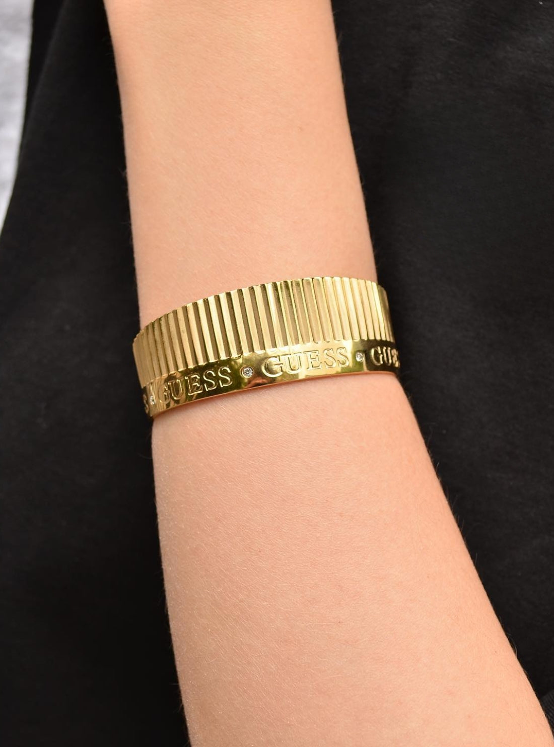 GUESS Accessories Gold Plisse Bangle Bracelet UBB70015 Model View
