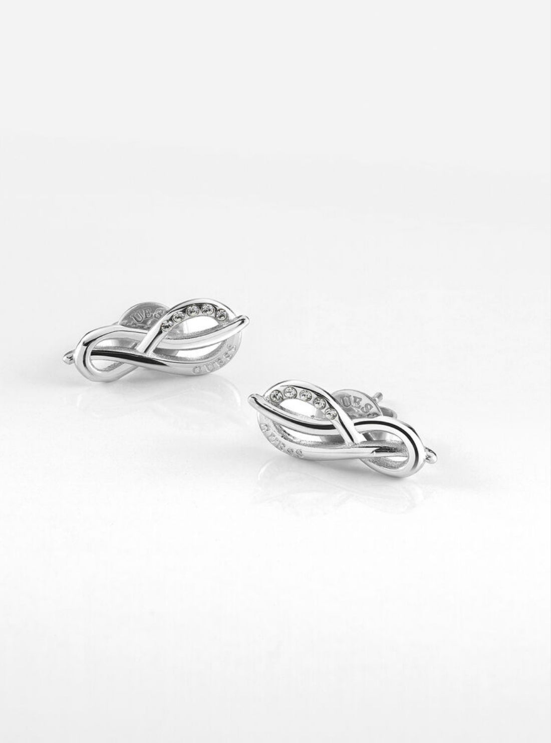 GUESS Womens Silver Pave Infinity Symbol Stud Earrings UBE20083SILVER Front View