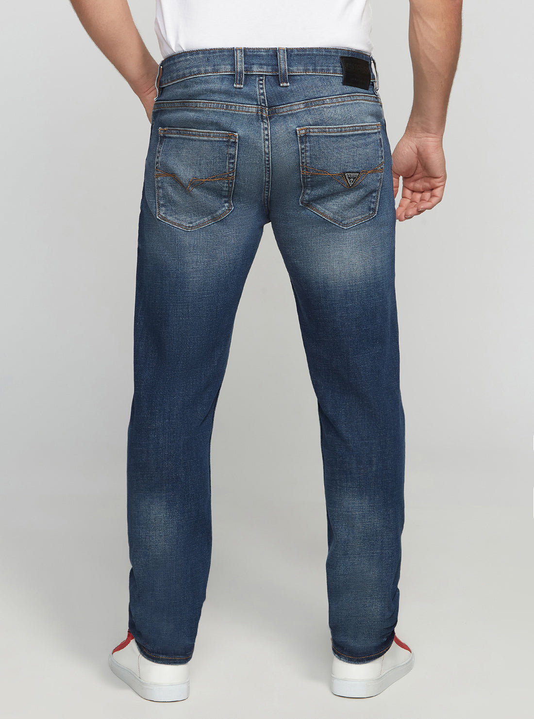 GUESS Men's Eco Low-Rise Slim Tapered Denim Jeans In Stratus Blue Wash MBGAS230411 Back View